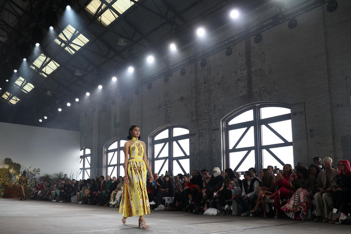 Lemon halter neck dress with a bubble skirt ‘Wirliyajarrayi Story' by Roseanna Larry OSSOM x Ikuntji Artists AAFW '23