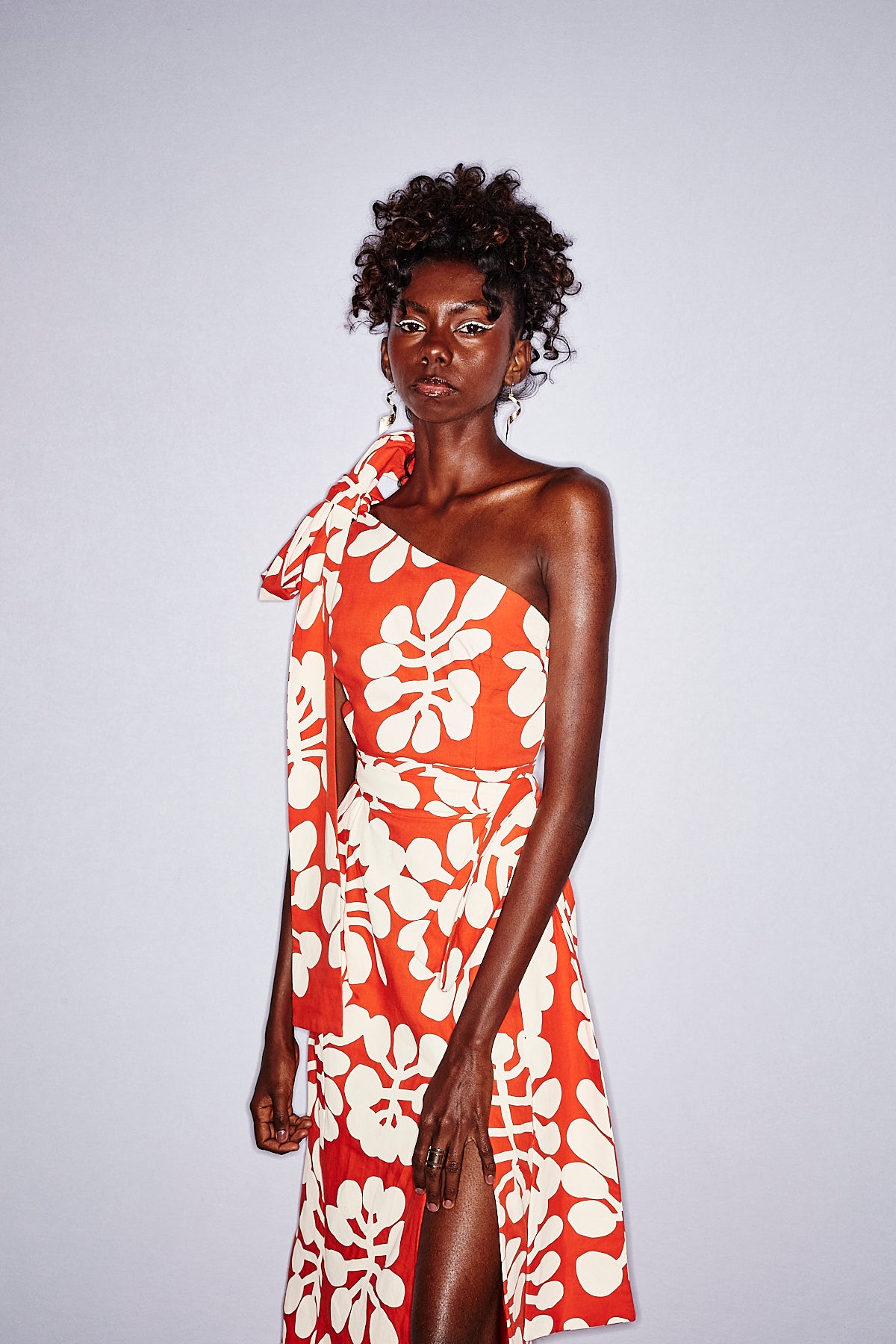 One-shoulder red maxi dress  in Mitjili Napurrula’s Watiya Tjuta fabric OSSOM x Ikuntji Artists AAFW '23