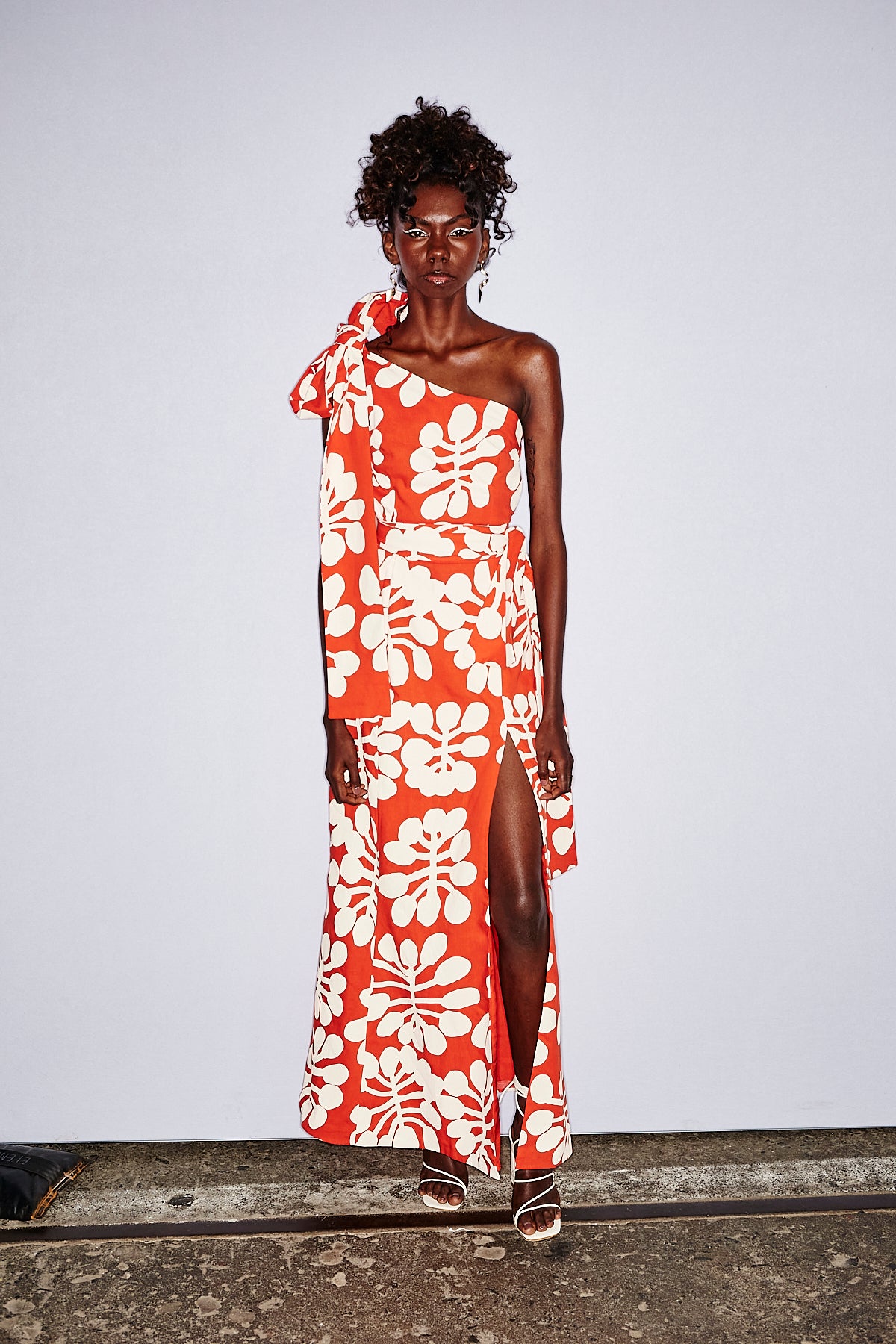 One-shoulder red maxi dress  in Mitjili Napurrula’s Watiya Tjuta fabric OSSOM x Ikuntji Artists AAFW '23