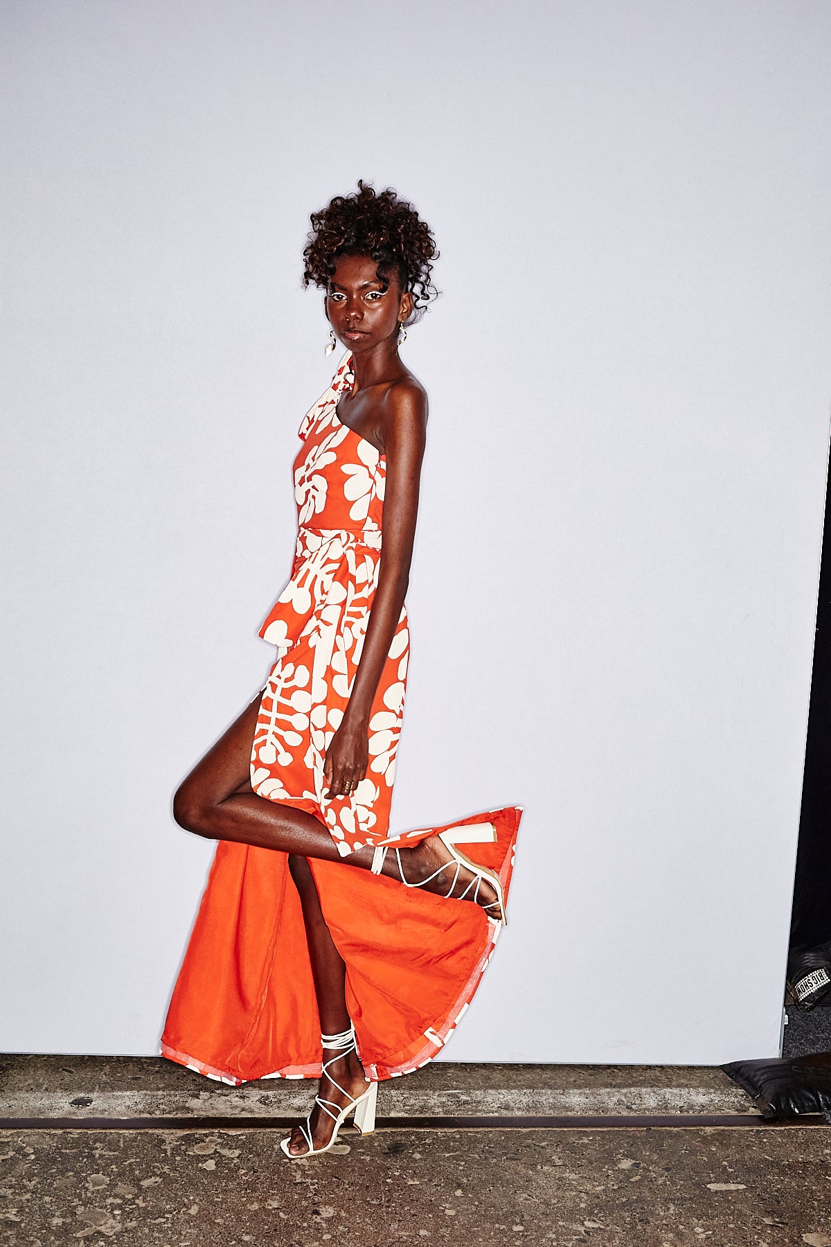 One-shoulder red maxi dress  in Mitjili Napurrula’s Watiya Tjuta fabric OSSOM x Ikuntji Artists AAFW '23